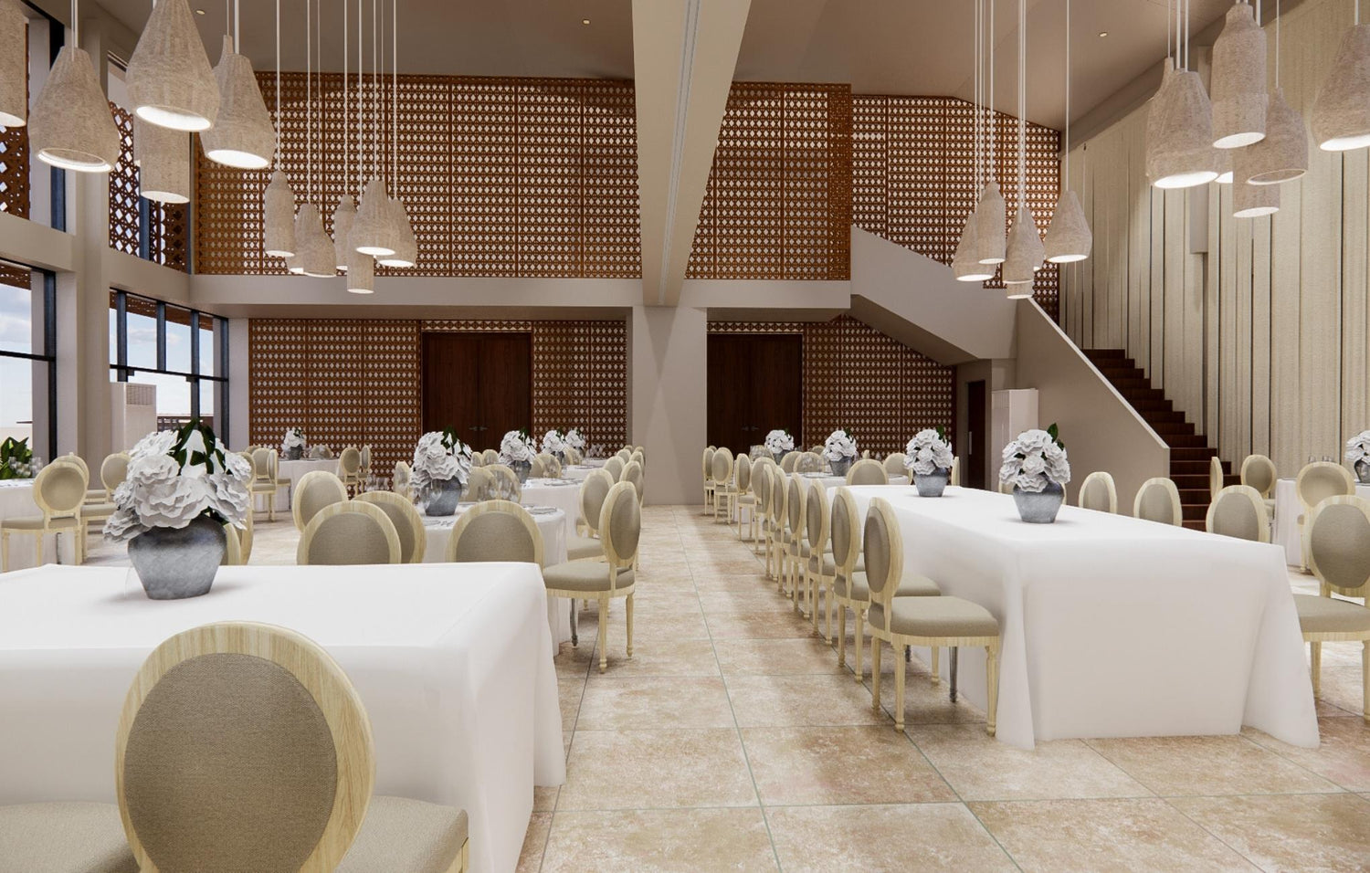 Elegant banquet hall interior with tables, chairs, hanging lights, and a grand staircase.