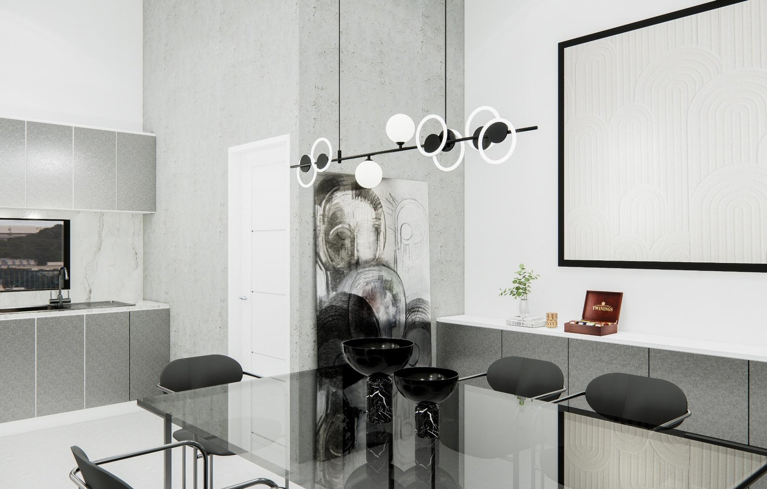 Modern kitchen with a black dining set, concrete walls, unique lighting fixture, and artwork.