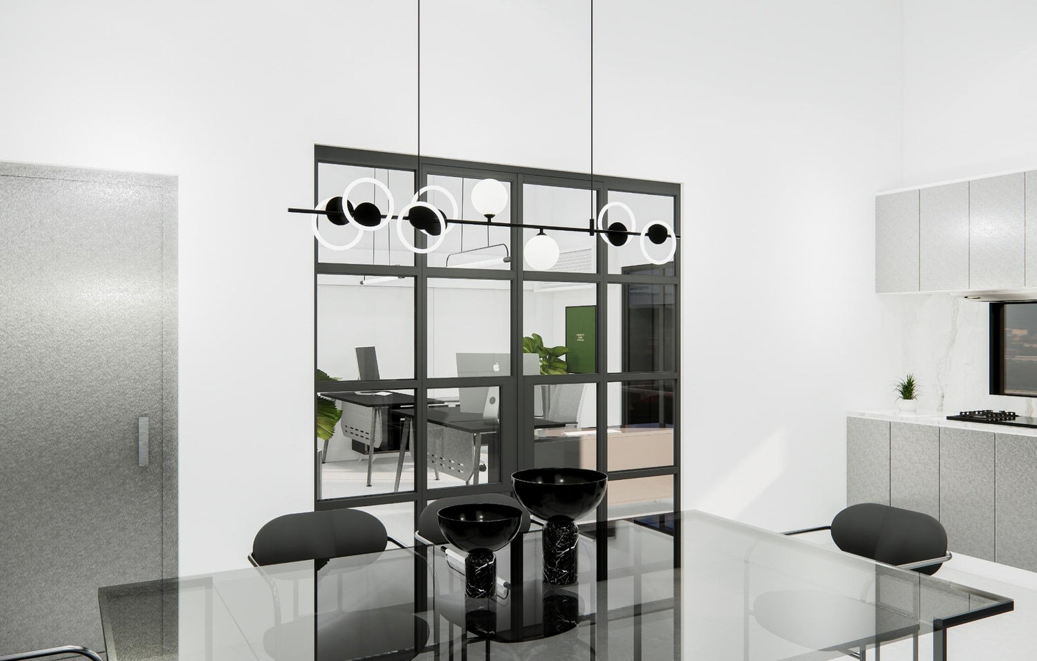Modern kitchen with glass dining table, black chairs, and pendant lights, overlooking an office area.