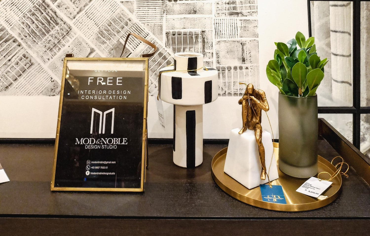  A table filled with various items and a sign reading "Free" inviting people to take what they like.