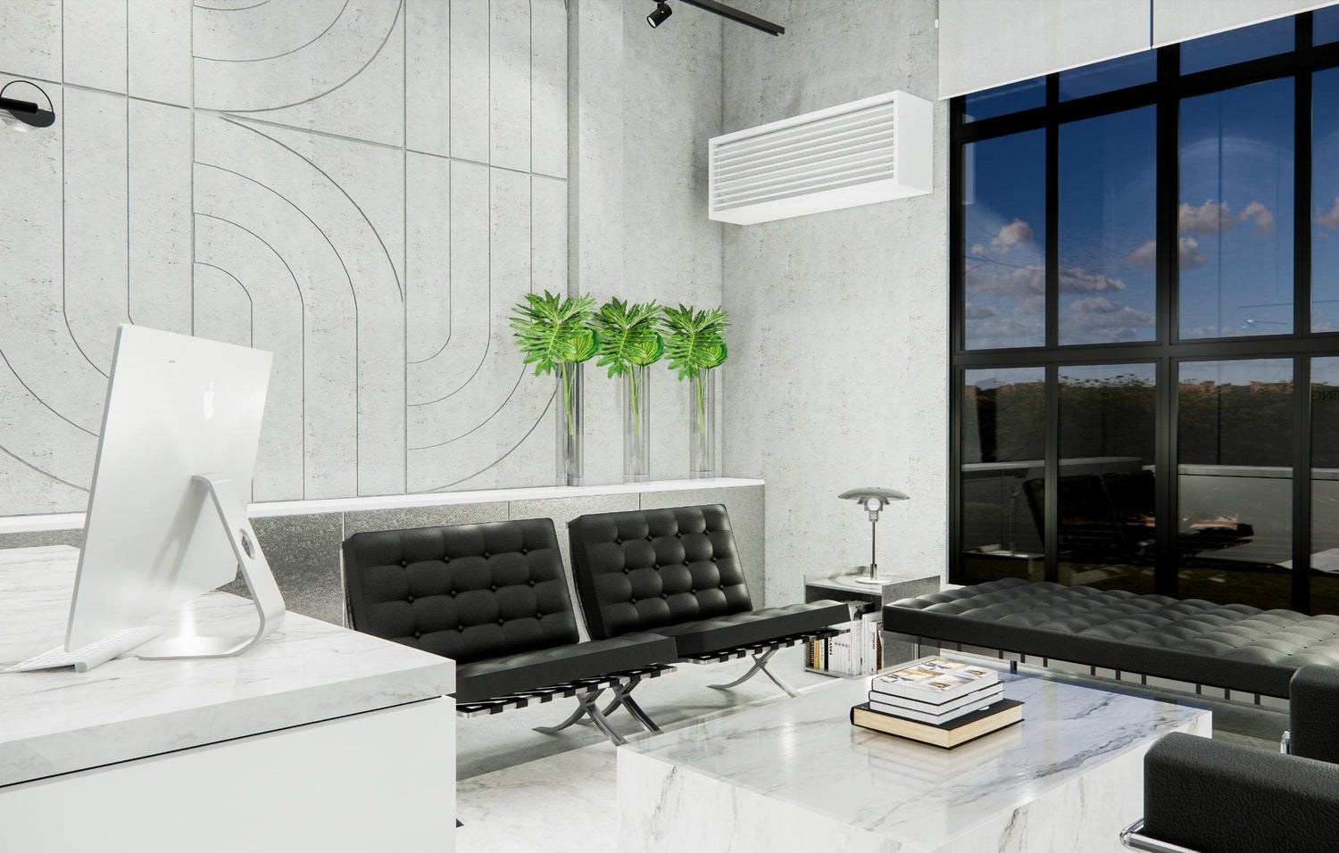 Modern office lobby with black sofas, white desk, computer, and large windows.