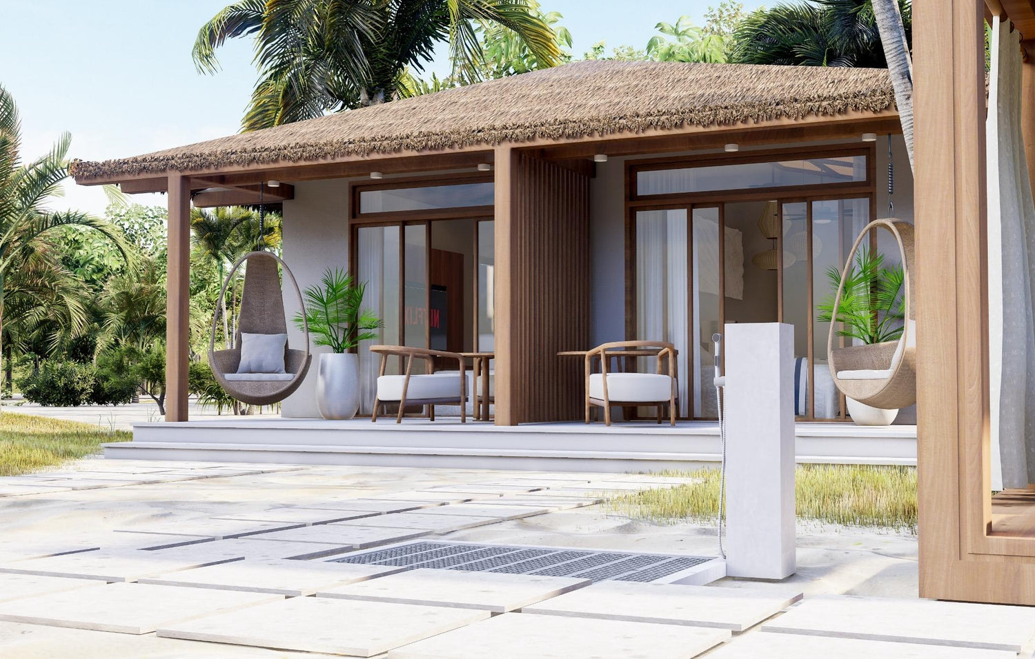 Tropical villa with a thatched roof, sliding doors, and a hanging chair on the patio.