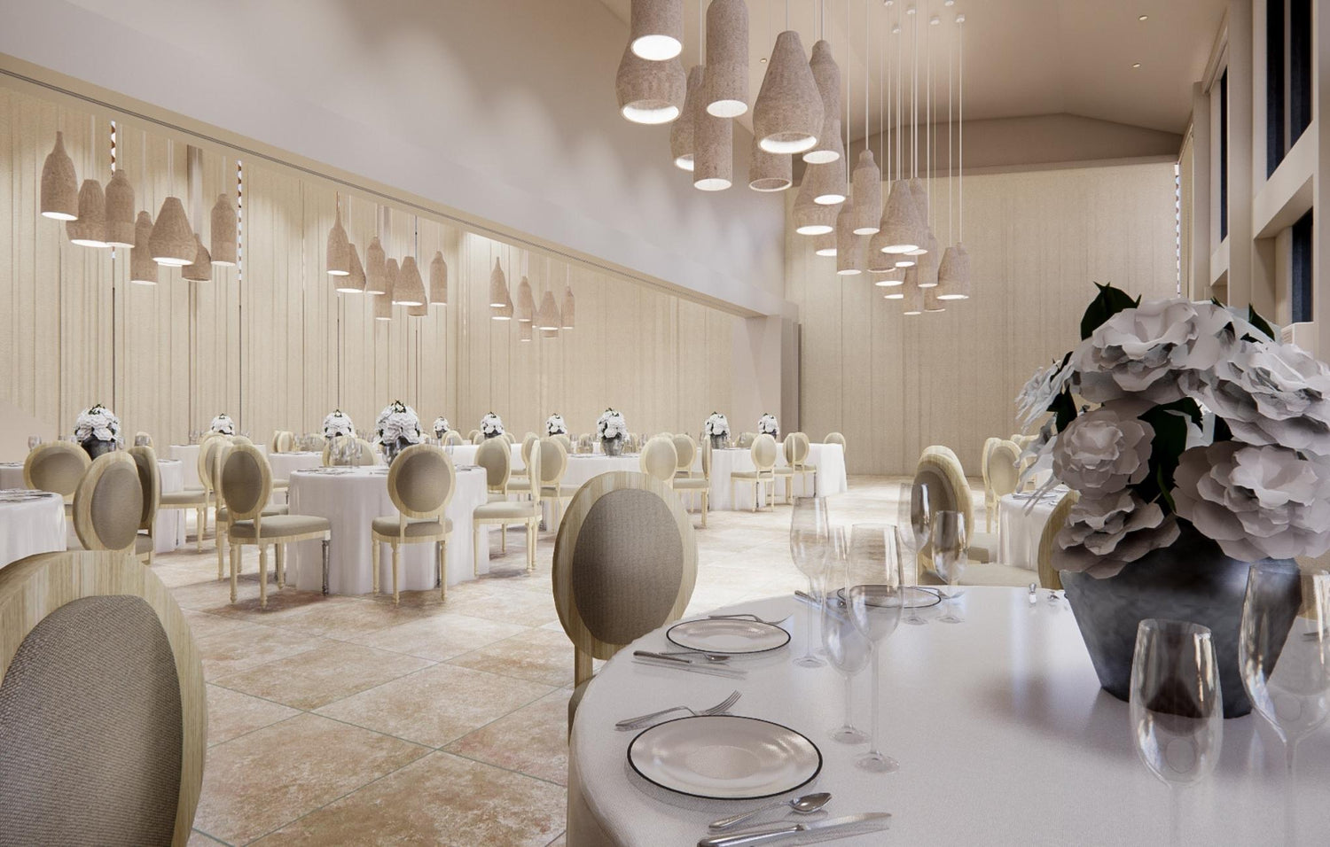 A large, open room featuring multiple tables and chairs, perfect for events or group activities.