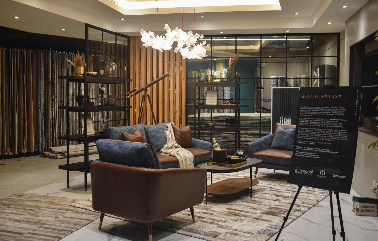 Modern living room display with stylish furniture and decorative lighting.