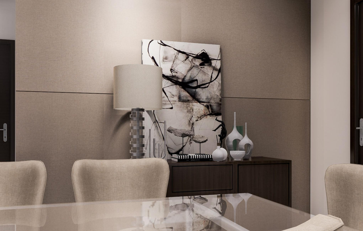 Modern dining room with abstract art, lamp on a cabinet, beige chairs, and reflective table.