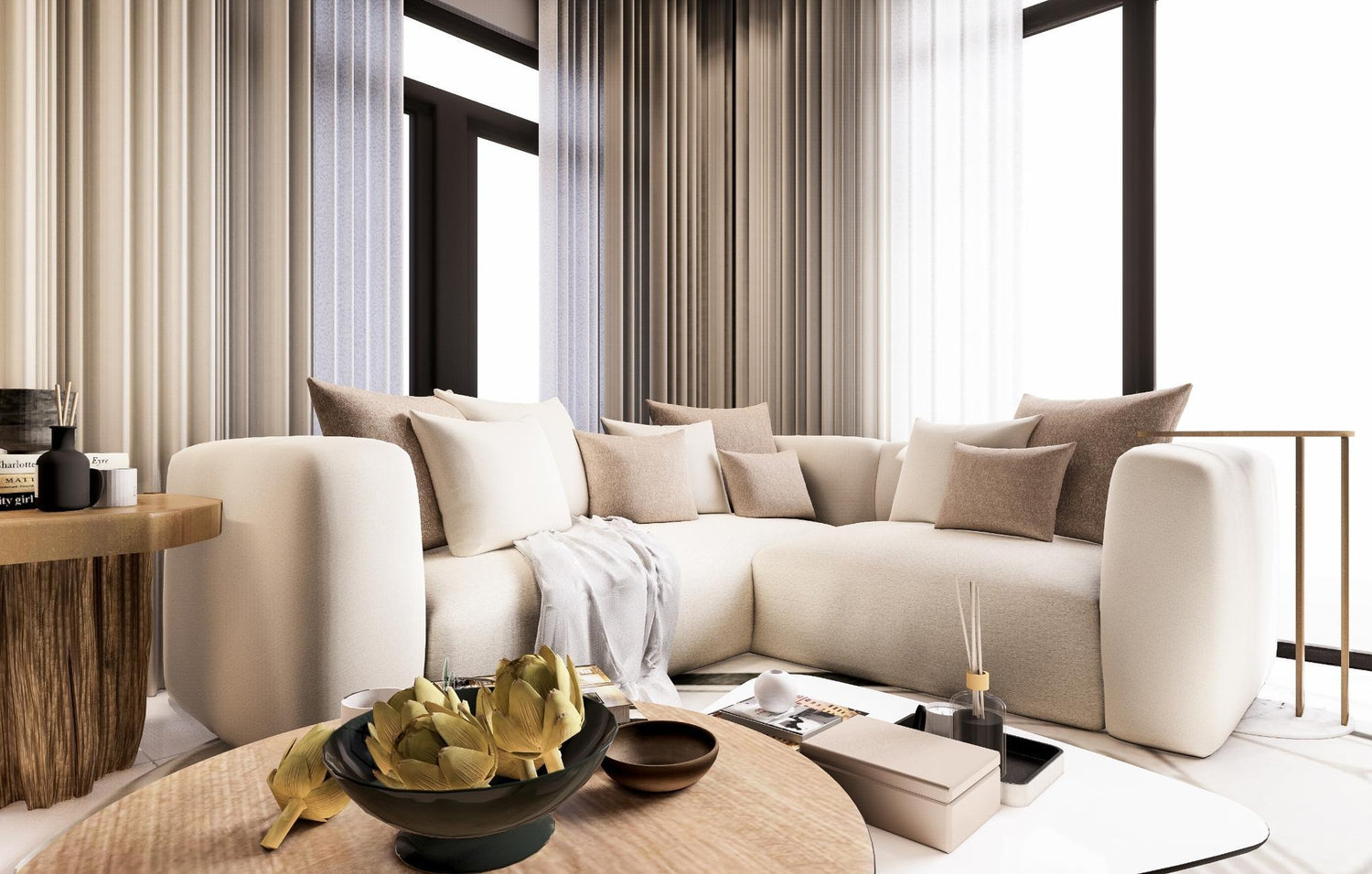A cozy living room featuring a white couch and a stylish coffee table, creating a welcoming atmosphere.

