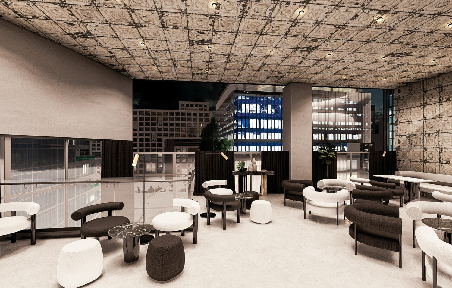 Modern office lounge with chic furniture and large windows overlooking city buildings at night.