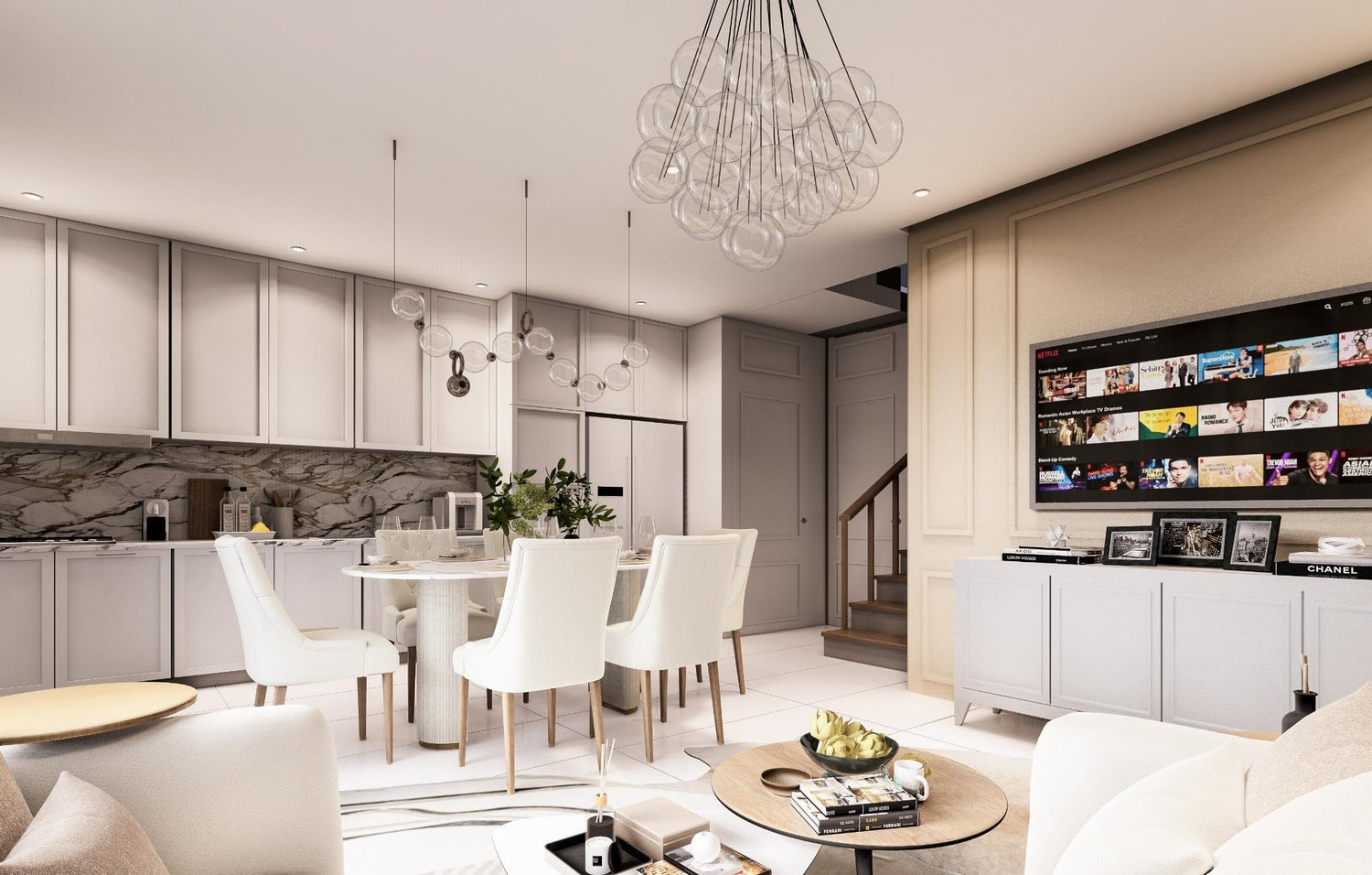 A stylish modern living room featuring an open kitchen and dining area, showcasing contemporary furniture and decor.
