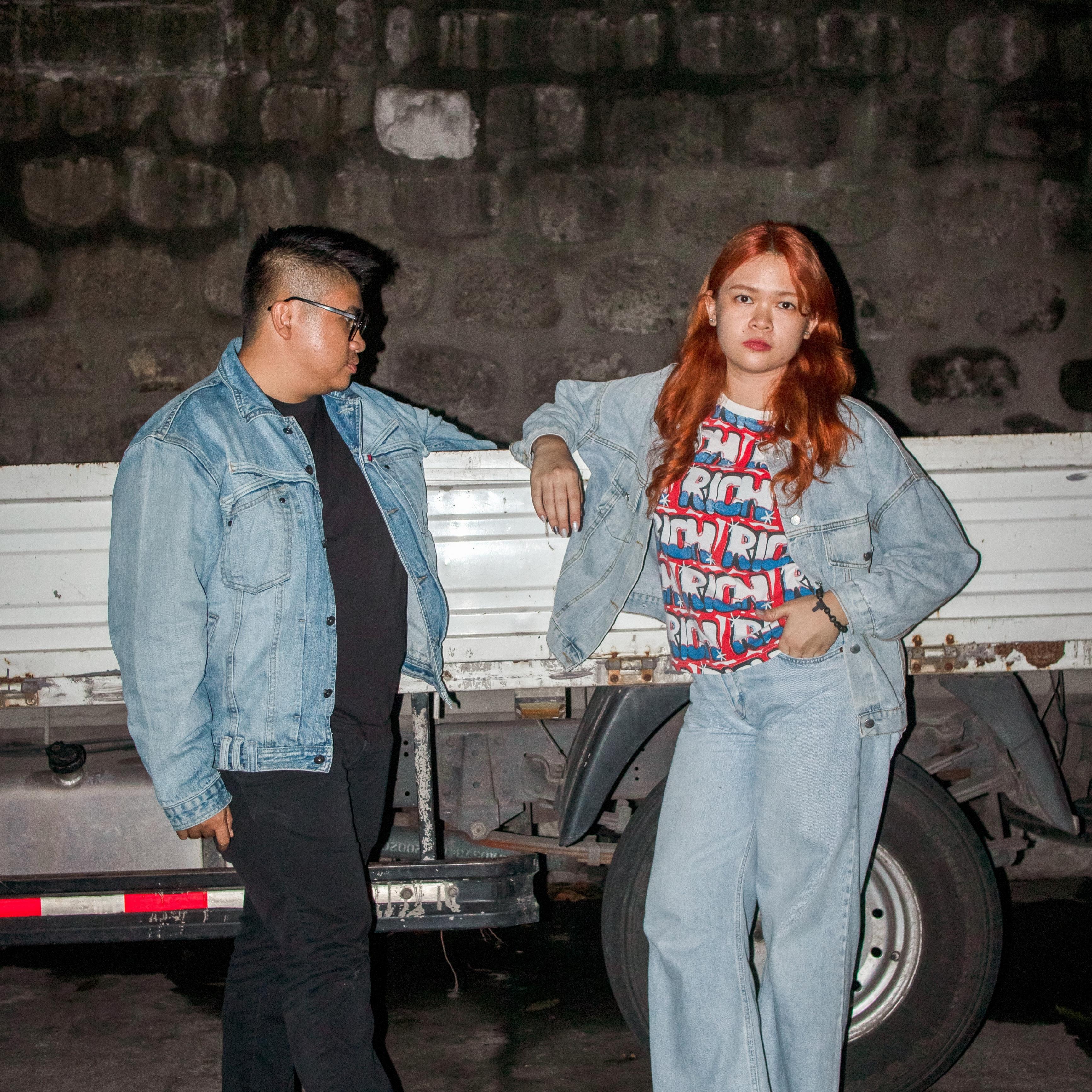 Roy Patrick Javier and Lizette Villareal pose next to a truck, showcasing their partnership.
