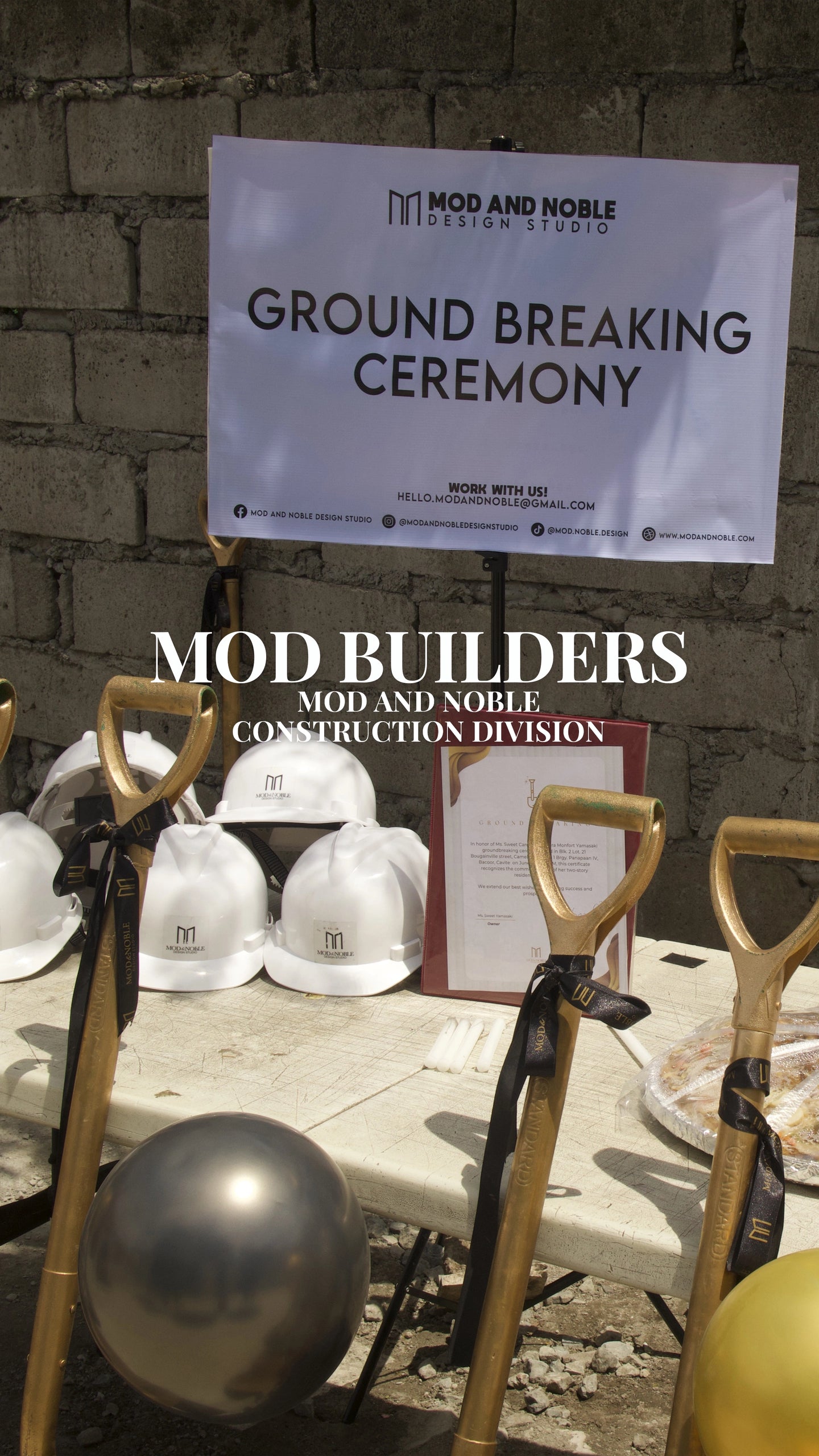 Groundbreaking ceremony setup with hard hats and ceremonial shovels by Mod and Noble Design Studio construction division